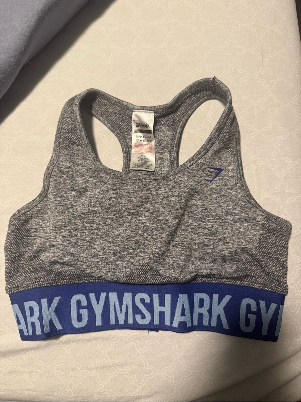 Never worn Gymshark Gray Sports Bra with Blue Branded Band